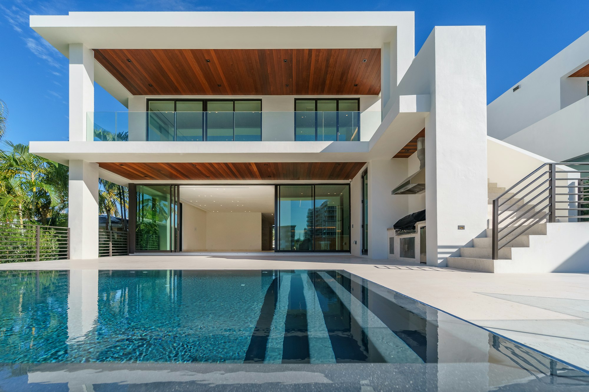 Aerial view of a modern luxury villa at dusk